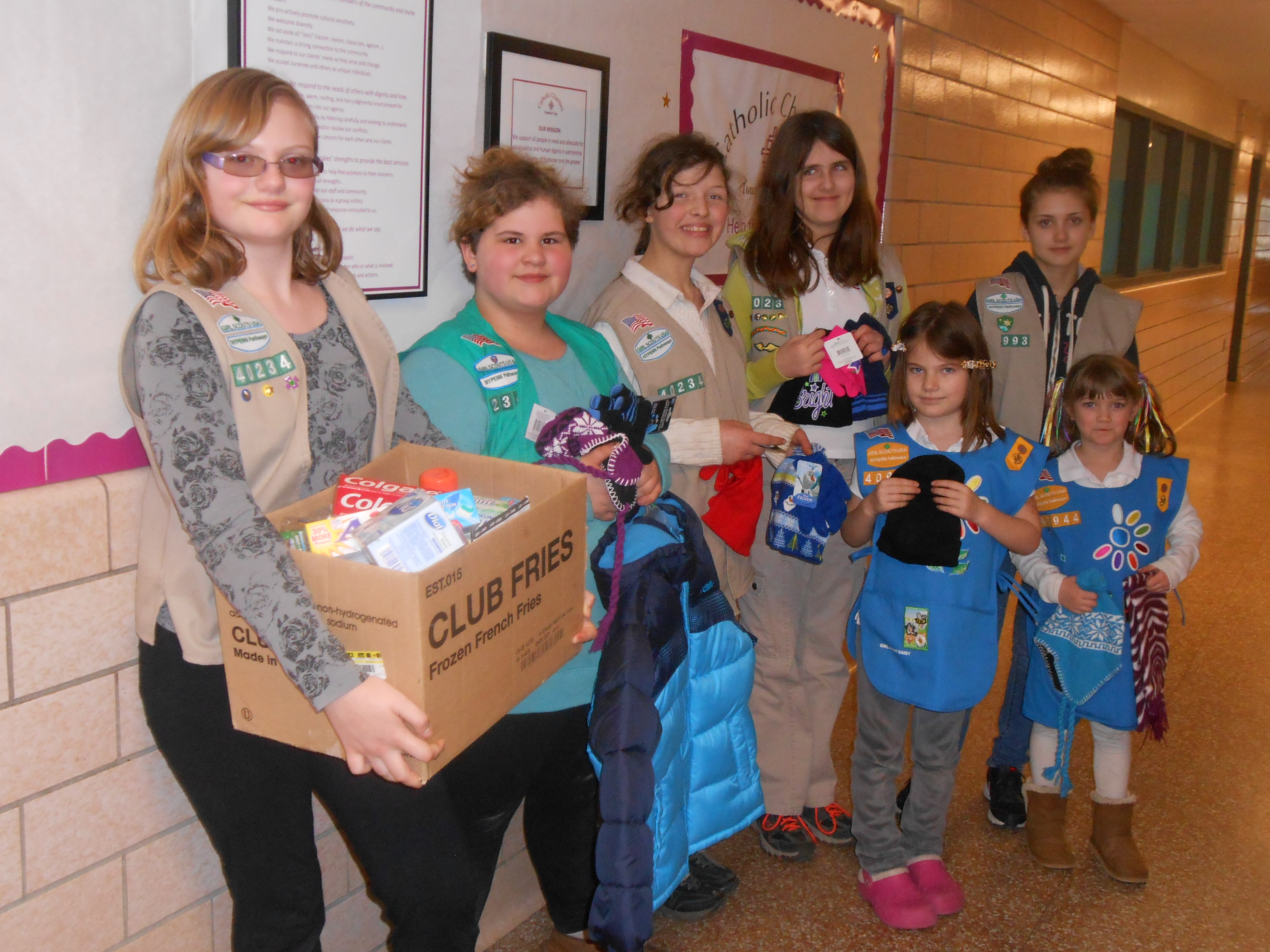 Girl Scouts donate to Catholic Charities Tioga Outreach Center