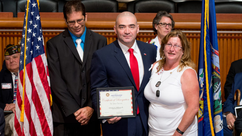 Senator Fred Akshar inducts SPC Charles E. Bilbrey, Jr. into the Veterans Hall of Fame