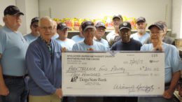 Donation presented to Park Terrace Food Pantry from Brothers for the Cross