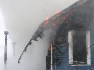 Firefighters battle blaze at the home to Owego Taxi