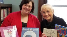 Women’s chapter donates books to the library in honor of Black History Month