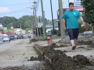 Moving mountains of mud; more rain forecast for today
