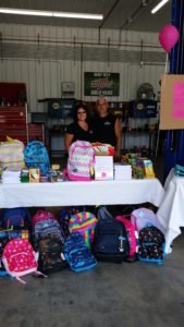 Open Door Mission receives backpack give-a-way donation