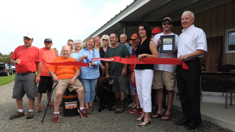 Bostwick celebrates the opening of the Auction Mall