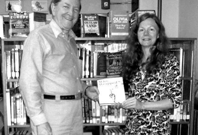 Che-Hanna Rock & Mineral Club presents book to Athens Public Library