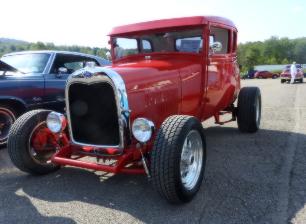 Cars and more cruise into Tioga Downs for annual show