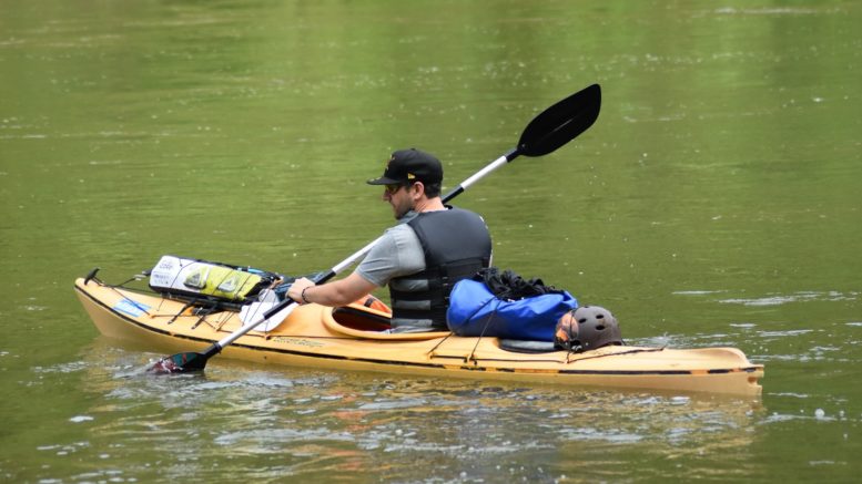 Man helping keep soldiers alive from kayak on the Susquehanna