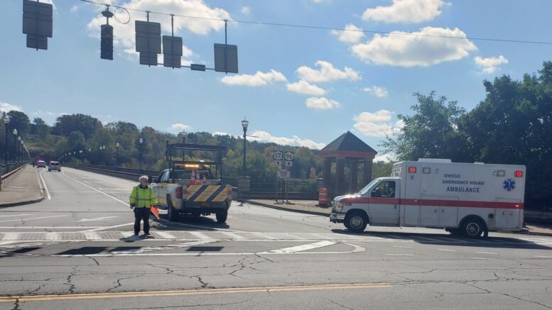 Police respond to emergency calls at the Court Street Bridge