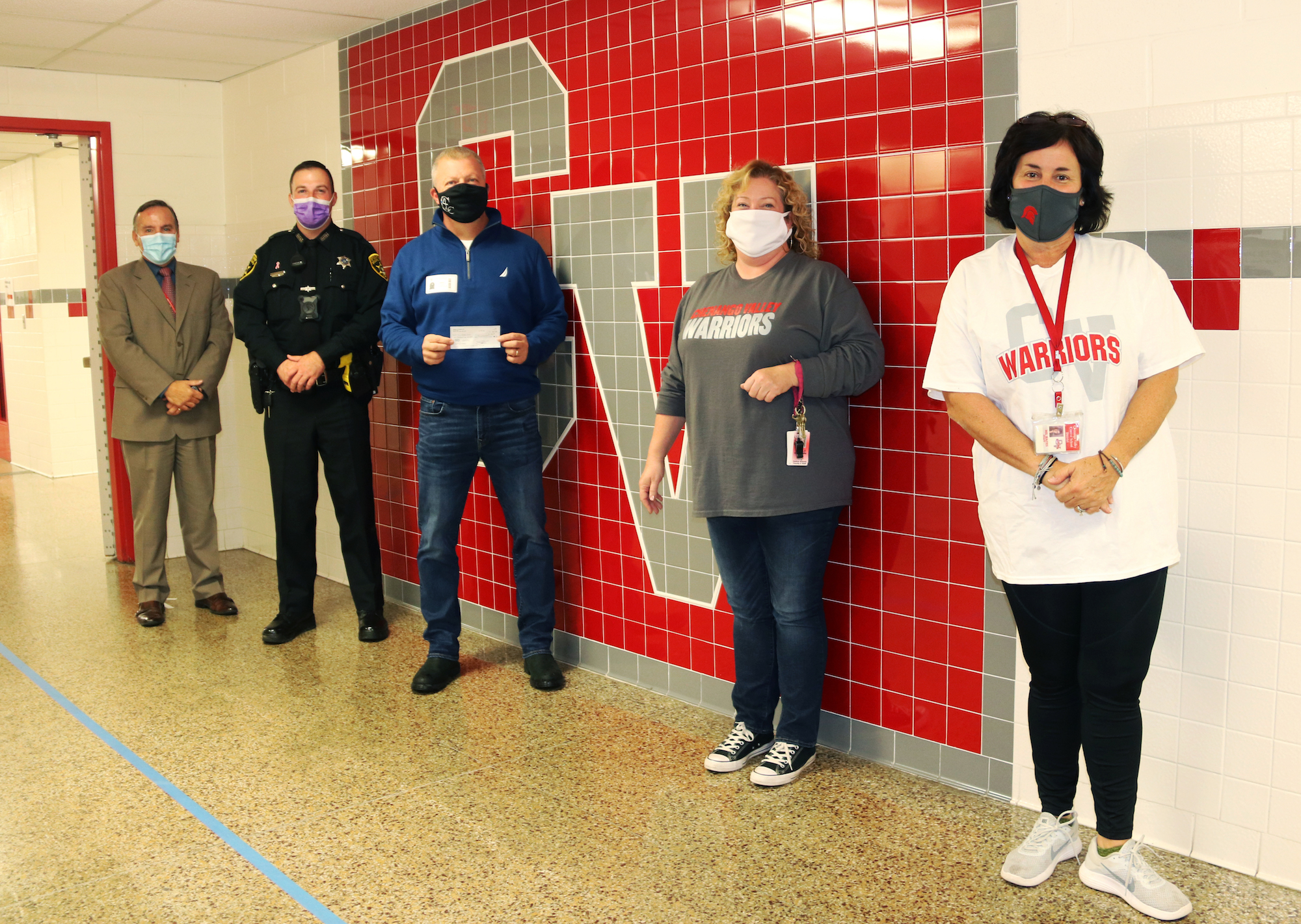 Cops 4 a Cause donates to programs helping community members of local school districts