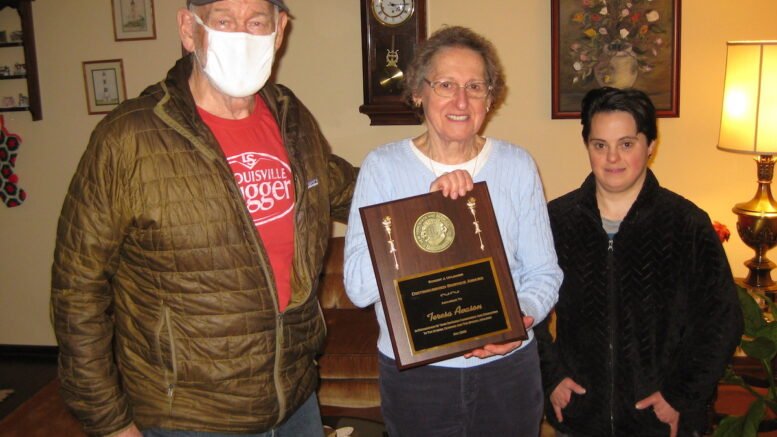 Teresa Aveson receives the Robert J. Uplinger Award