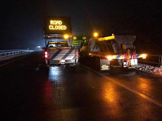 Crane helps remove large piece of machinery off 17