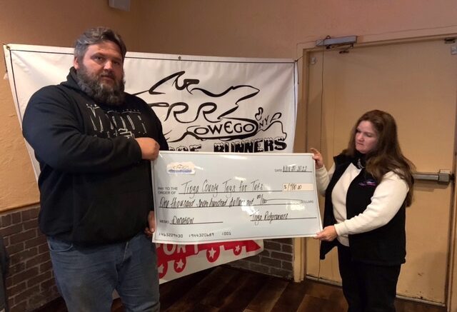 Tioga Ridge Runners donate to help local children this Christmas