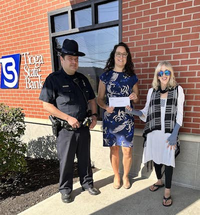 Tioga State Bank presents check for Village Appreciation Night