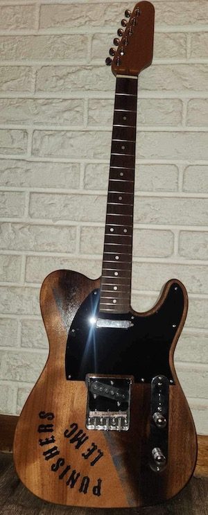 Guitar raffle to help a friend in need