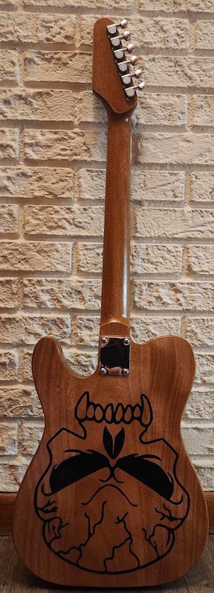 Guitar raffle to help a friend in need