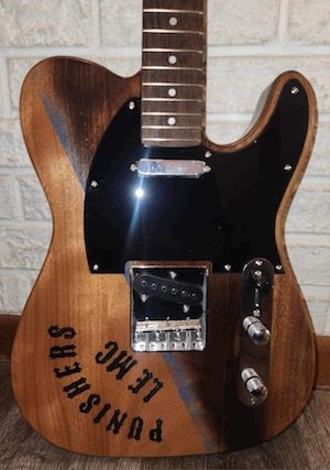 Guitar raffle to help a friend in need