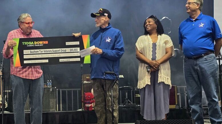 Tioga Downs Presents $95,680 Check To Southern Tier Veterans Support Group; Jeff Gural presents check on stage prior to August 16 Ashley McBryde Concert