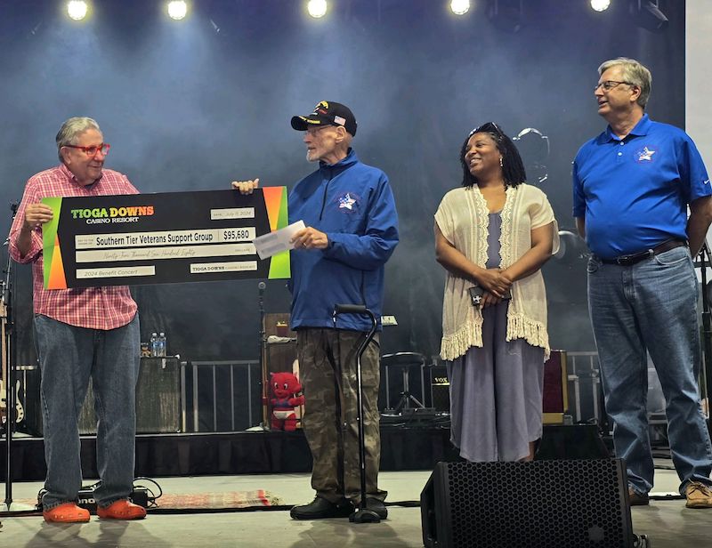 Tioga Downs Presents $95,680 Check To Southern Tier Veterans Support Group; Jeff Gural presents check on stage prior to August 16 Ashley McBryde Concert