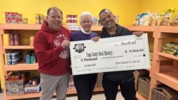 Ice Bowl presents check to TCRM