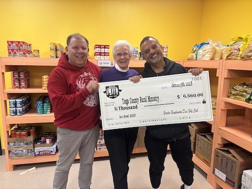 Ice Bowl presents check to TCRM